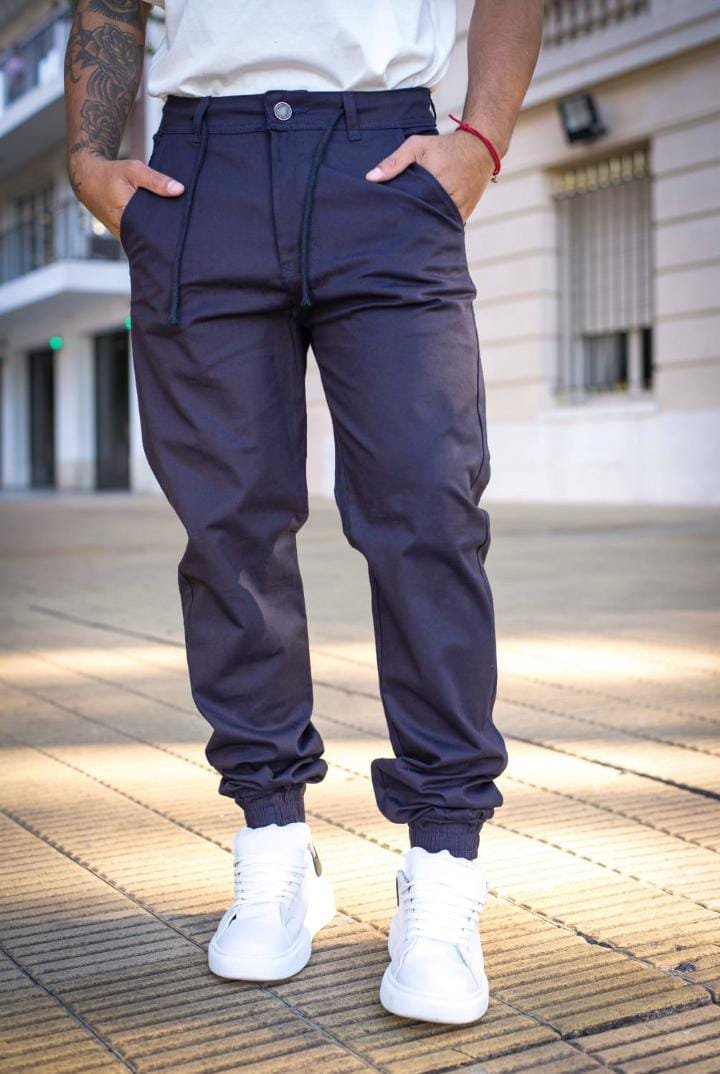 PANTALÓN JOGGER CON PUÑO AZUL PETROLEO DE GABARDINA IMPORTADA TALLES 38-44 MARCA CRUZO